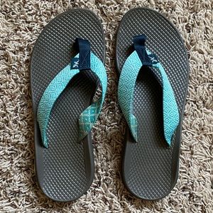Women’s gray and blue Chaco flip flops. Size 7